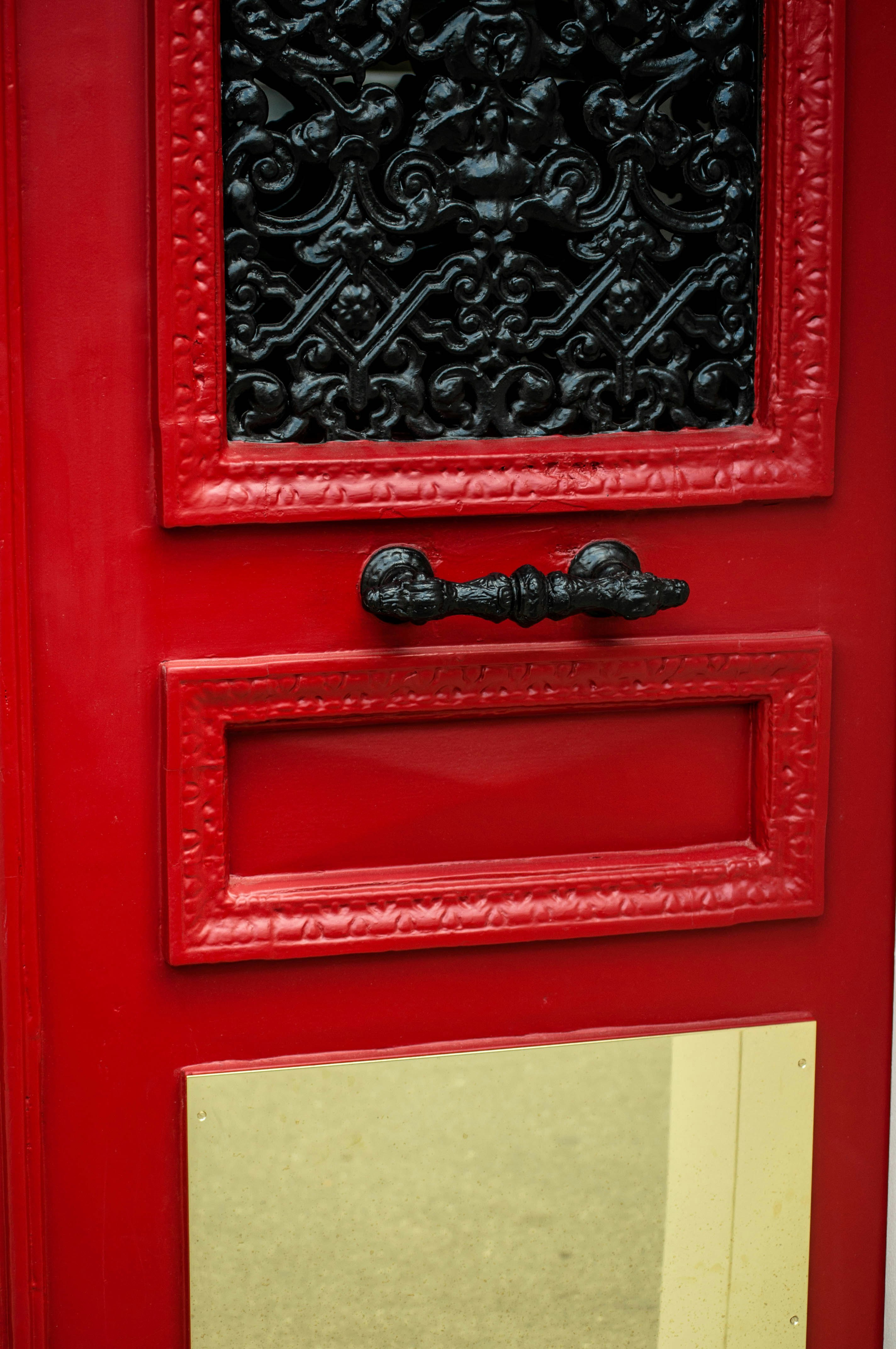 red and black wooden door